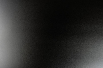 Background in a black, soft color illuminated with a delicate light.