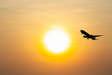 airplane taking off airport sky-diving industry cargo business, concept: passenger Commercial  modern navigable Travel and business,Silhouette aircraft is flying above skyline sun