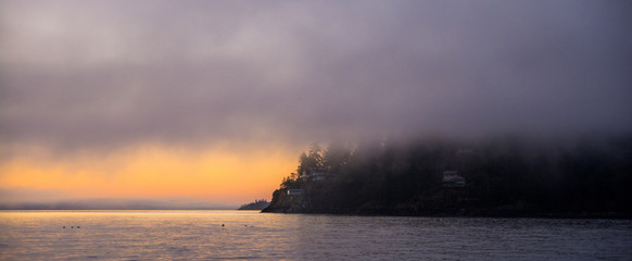 Calm and foggy sunrise near Vancouver island.