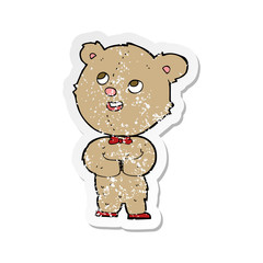 retro distressed sticker of a cartoon cute teddy bear