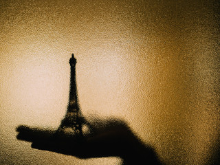 Shadow of the eiffel tower on a glass