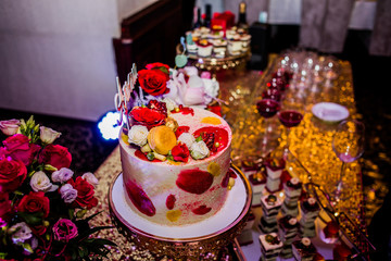 Decorating the festive hall in pink and golden shades. Candy Bar