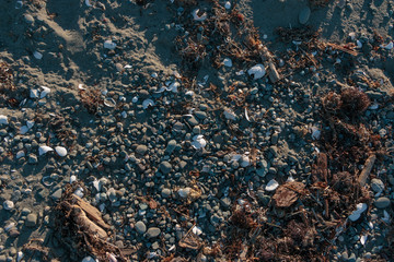 Beach sand and pebbles texture and background. v2