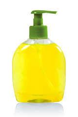 Yellow liquid soap in a plastic bottle on a white background with reflection. Concept of hygiene