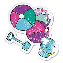 distressed sticker cartoon doodle beach balls with a bucket and spade