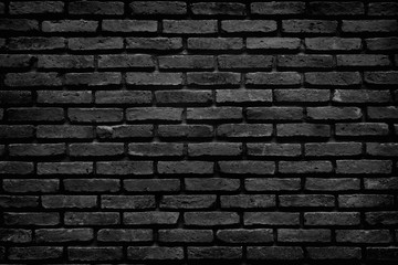 Surface of black brick stone wall textured for background