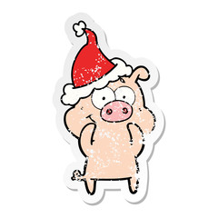 happy distressed sticker cartoon of a pig wearing santa hat