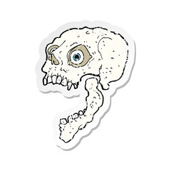 retro distressed sticker of a cartoon scary skull