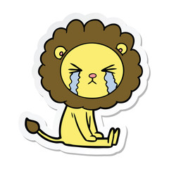 sticker of a cartoon crying lion