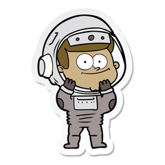 Obraz premium sticker of a happy astronaut cartoon