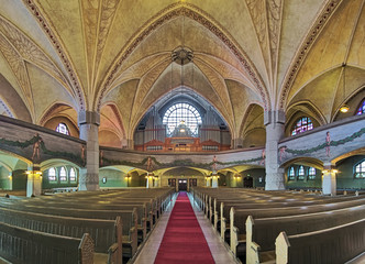 Panoramic view of interior of Tampere Cathedral with main organ, Finland. The Cathedral was built in 1902-1907.