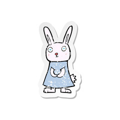 retro distressed sticker of a cartoon rabbit
