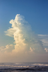 Naklejka na ściany i meble Beautiful Cumulonimbus clouds at the beach