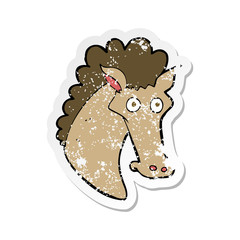 retro distressed sticker of a cartoon horse head