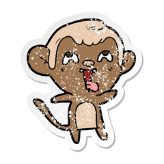 distressed sticker of a crazy cartoon monkey