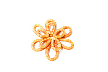 spanish fritters in flower shape on white background