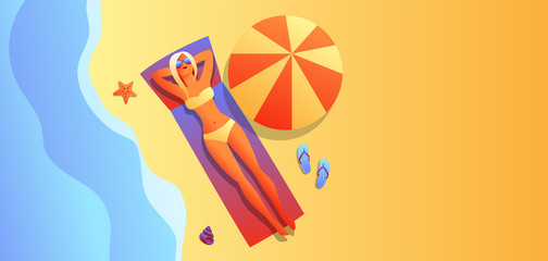 Girl in bikini sunbath and relax.