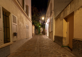 Fototapeta na wymiar Paris. Old street on the Montmartre hill.