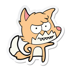 sticker of a cartoon grinning fox