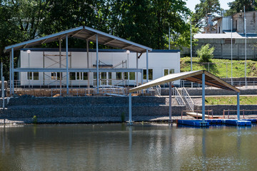 Life-saving station under construction on river bank
