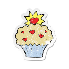 retro distressed sticker of a cartoon love heart cupcake