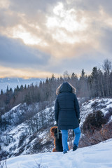 Woman & Dog looking into the Canadian West