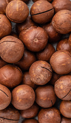 Macadamia nuts close up. Breakfast, healthy food. It can be used as a background