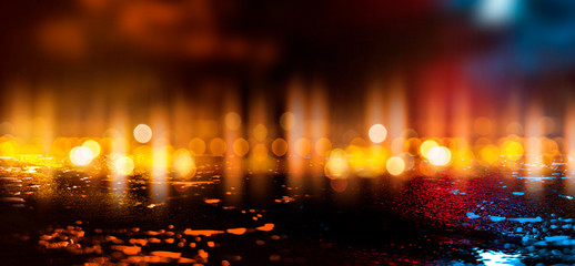 Fototapeta premium Wet asphalt, reflection of neon lights, a searchlight, smoke. Abstract street with smoke, smog. Night background, night city Abstract bokeh light, night bokeh.