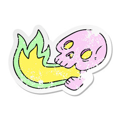 distressed sticker of a fire breathing quirky hand drawn cartoon skull