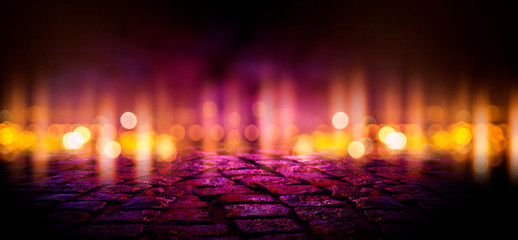 Fototapeta premium Wet asphalt, reflection of neon lights, a searchlight, smoke. Abstract street with smoke, smog. Night background, night city Abstract bokeh light, night bokeh.