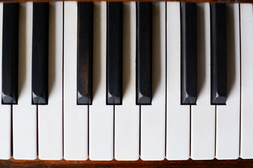 Piano keyboard of a classic wooden piano
