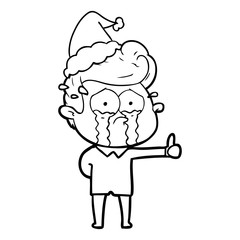 Obraz premium line drawing of a crying man wearing santa hat
