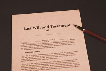 Notary's public pen and stamp on testament and last will. Notary public tools