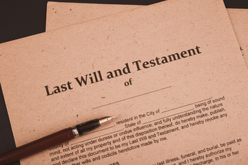 Notary's public pen and stamp on testament and last will. Notary public tools