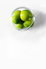 lime in the bottle on white background