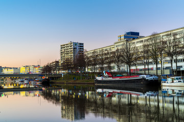 Germany, Beautiful city saarbruecken reflecting in saar river at dawn