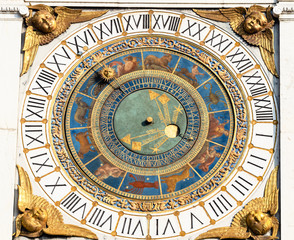 Fototapeta na wymiar medieval clock on Tower in Brescia city