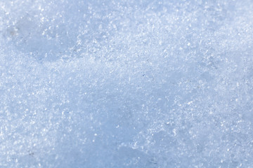Snow background with detailed snowflakes. Macro photo of snow