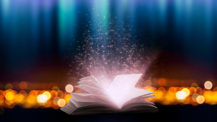 An open book with a magical fantasy. Night view illustration with a book. The magical power of...