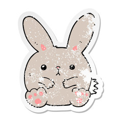 distressed sticker of a cartoon rabbit