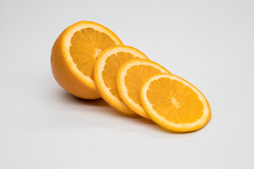 slice of fresh orange on white background