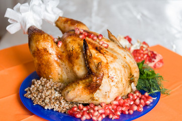 whole fried chicken with buckwheat and pomegranate