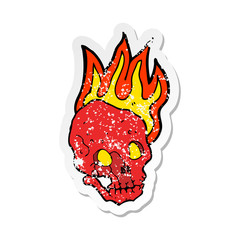 retro distressed sticker of a cartoon flaming skull