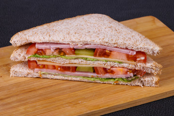 Club sandwich with ham and cheese