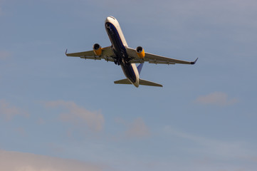 Airplane climbs after takeoff, from the ground.