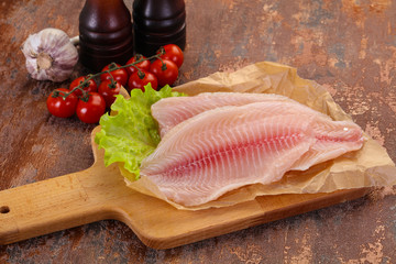 Raw tilapia fish