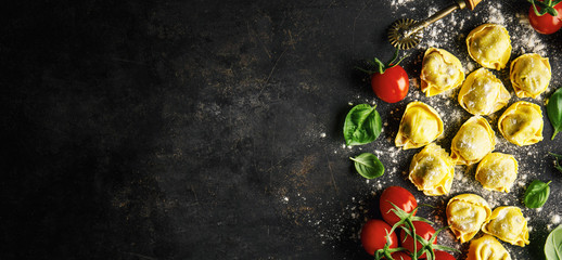 Italian food background on dark