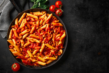 Classic penne pasta with tomato sauce - obrazy, fototapety, plakaty