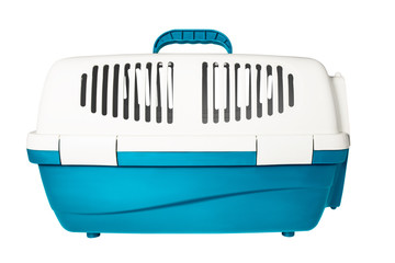 Plastic cage carrying for dogs and cats isolated on white. Travel transportation, veterinary clinic and pet care concept