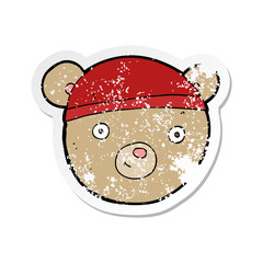 retro distressed sticker of a cartoon teddy bear head